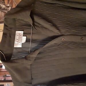 Ladies blouse, Daniel Laurent, 100% polyester. Made in Indonesia. Size small.